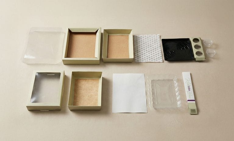 Original catering packaging components before modular system redesign